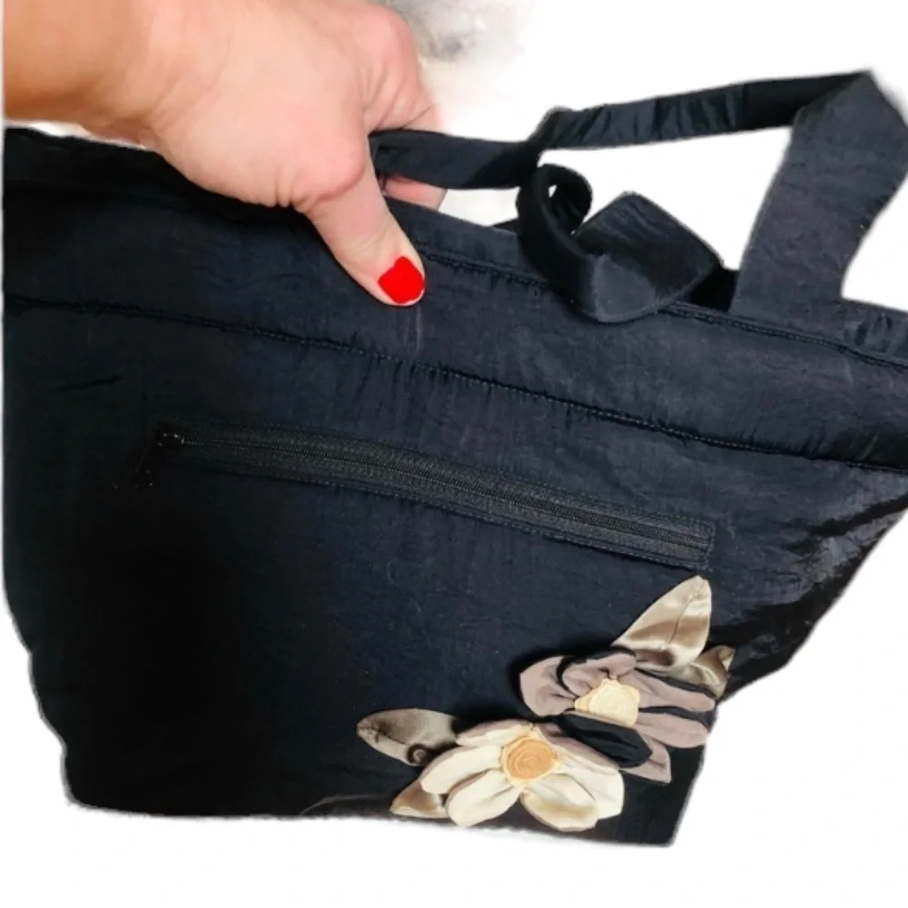 Arisha black super cute microfiber like fabric bag w/ attached flower detail